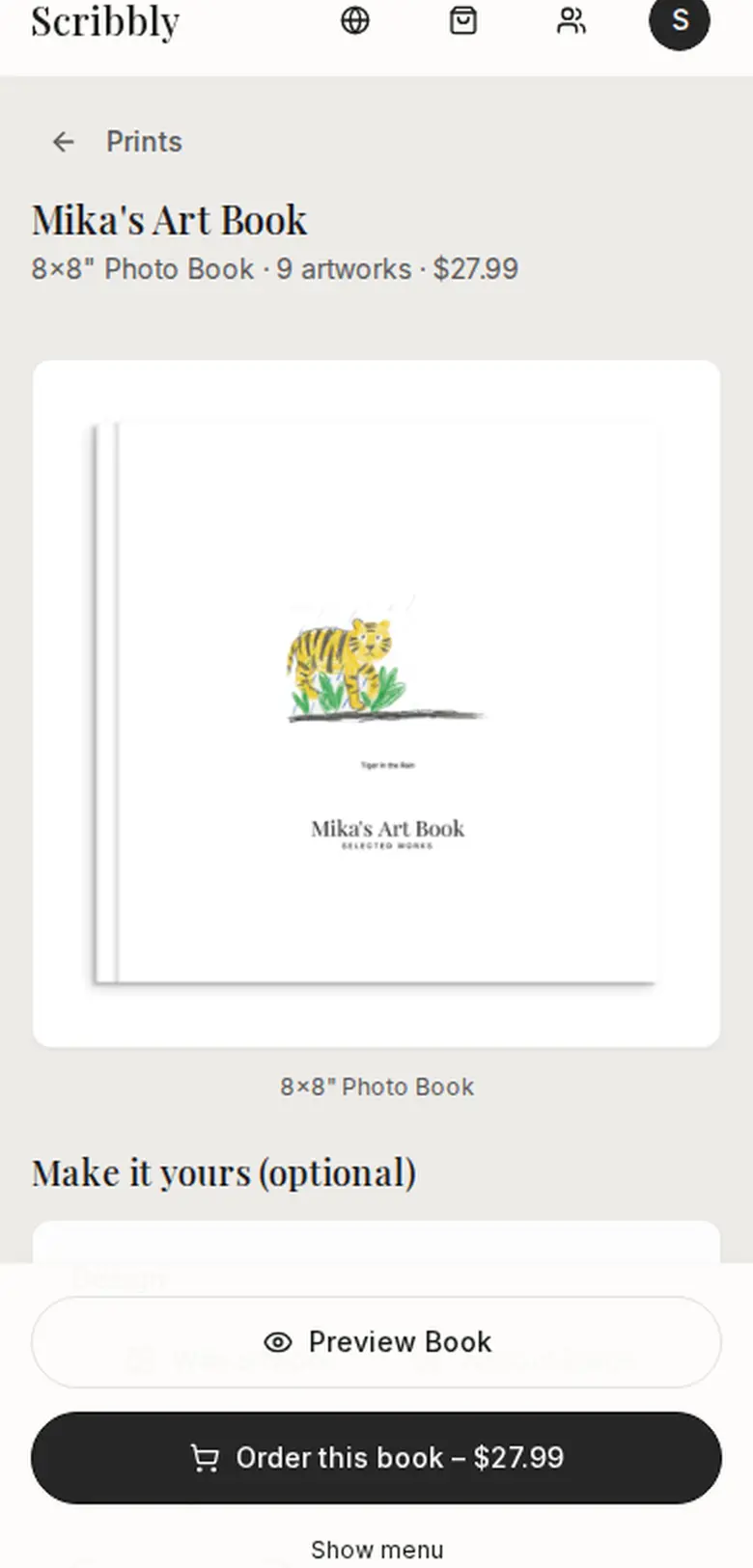The Scribbly app showing a printed keepsake book with a child's tiger drawing on the cover
